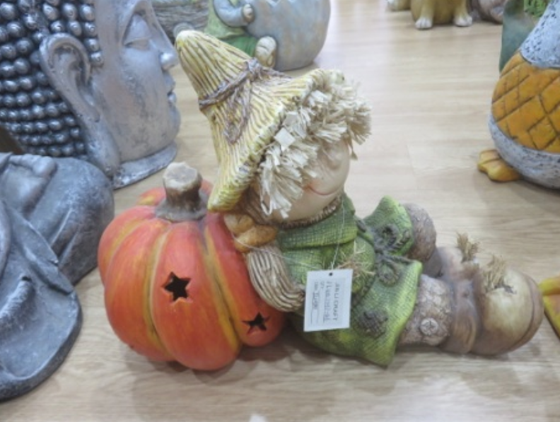 Straw Kids on Pumpkin Statue